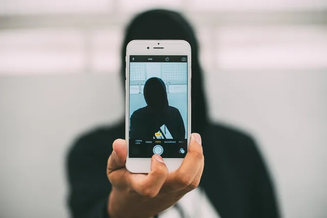 iphone, taking photo, phone, anonymous, selfie, hoody, hoody sweater, selfie, selfie, selfie, selfie, selfie. How US parents can vet anonymous apps NGL and Yik Yak