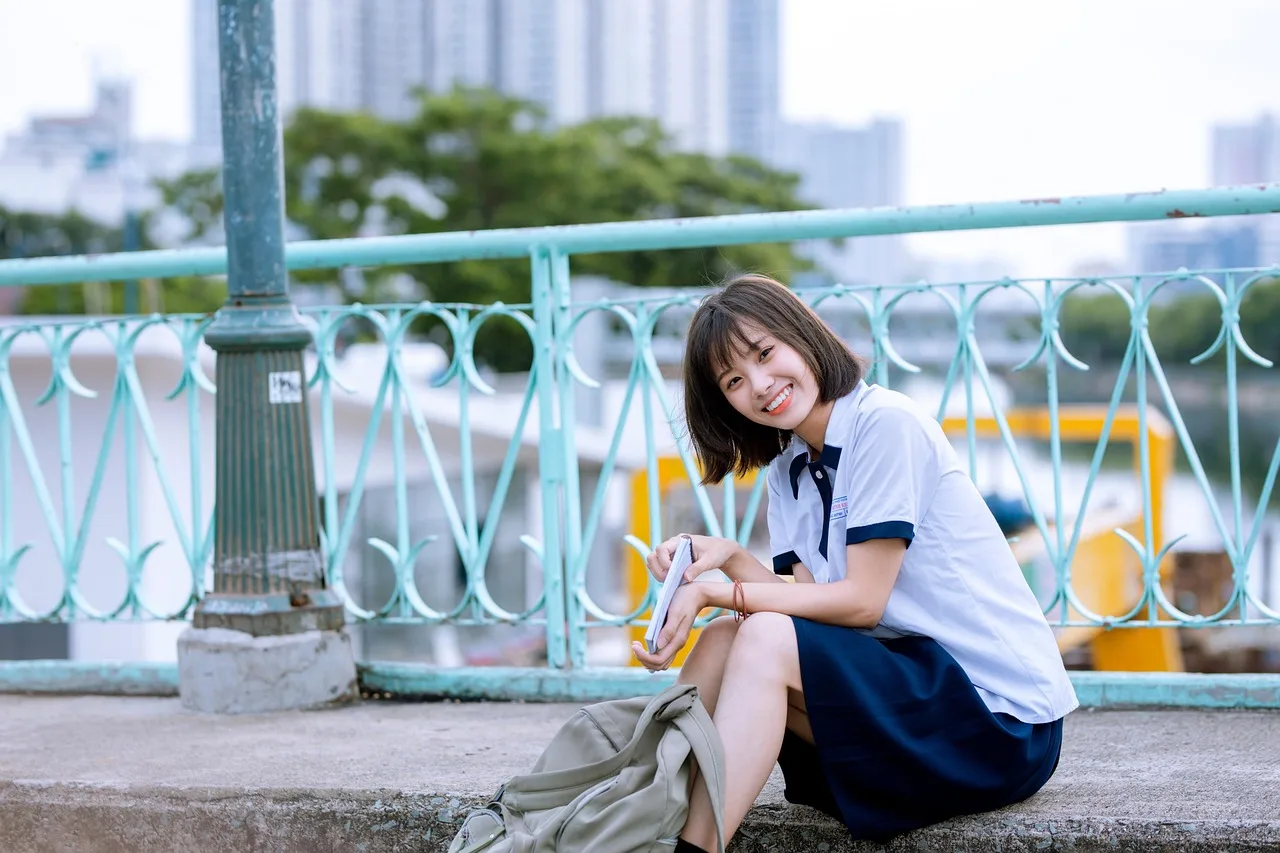 girl, student, smile, happy, young woman, teen, teenager, school girl, uniform, school uniform, pose, portrait. What the CDC Youth Risk Behavior Survey reveals about American teens and social media