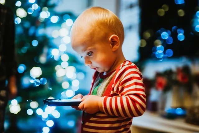christmas wallpaper, baby, toddler, phone, smartphone, cute, happiness, kid, child, joy, play, christmas, bokeh. Denver and Colorado youth social media rules, age verification and what parents must know