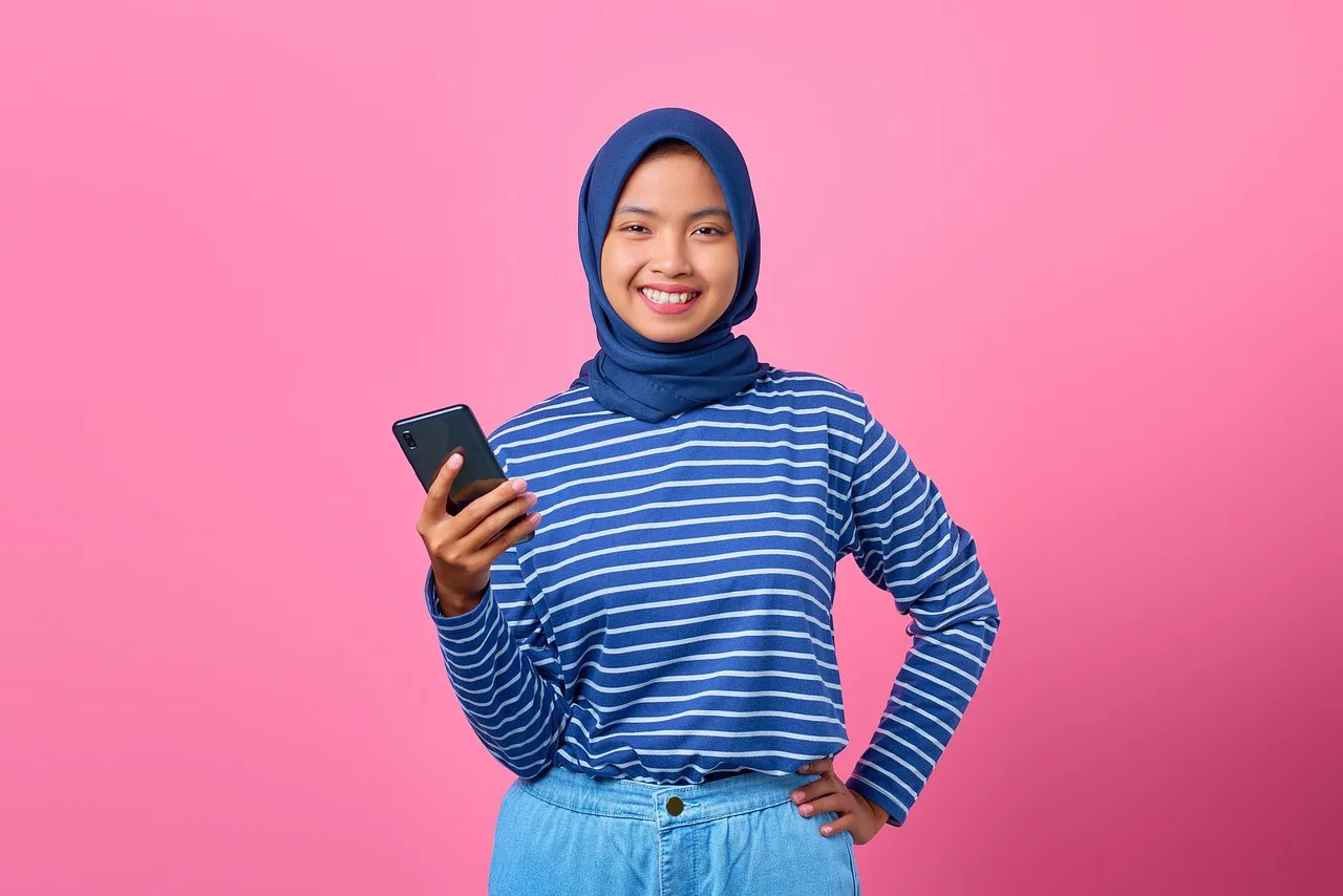 girl, smartphone, happy, portrait, smile, joyful, cellphone, teenager, hijab, charm, cheerful, mobile phone, online, phone, confidence, attractive, model, pose, asian, pink background, girl, smartphone, teenager, teenager, teenager, teenager, hijab, hijab, hijab, hijab, hijab, mobile phone, online, online, phone, confidence, confidence, pink background. Password manager for teens: US comparison of Dashlane vs Bitwarden