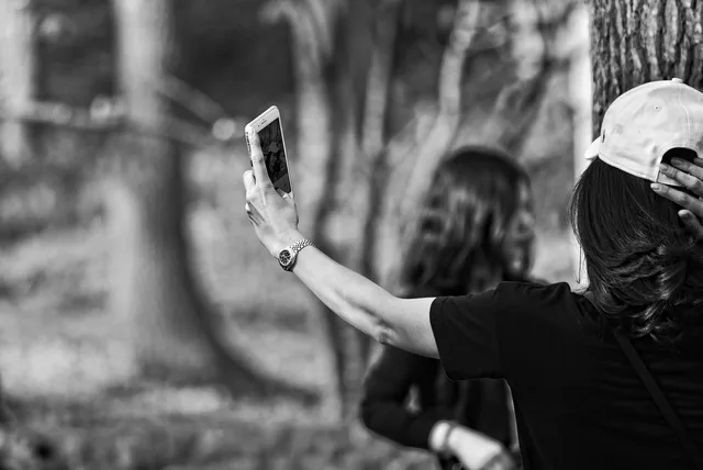 arm, hand, body, woman, smartphone, selfie, picture, shooting, photography, ego, narcissism, vanity, gray phone, gray mobile, gray photography, gray body, gray smartphone, gray telephone, ego, ego, ego, narcissism, narcissism, narcissism, narcissism, narcissism, vanity. Self-esteem and body image shift when a phone replaces the mirror